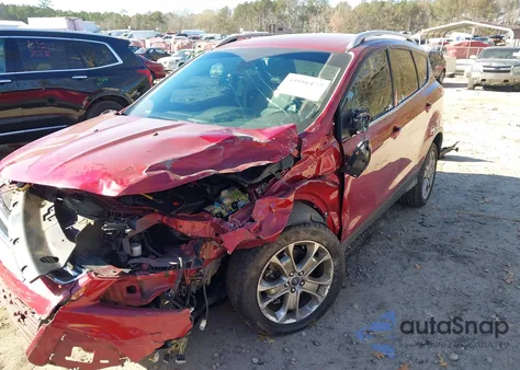 2014 Ford Escape Titanium z USA, uszkodzony, nr VIN 1FMCU0J94EUB38523